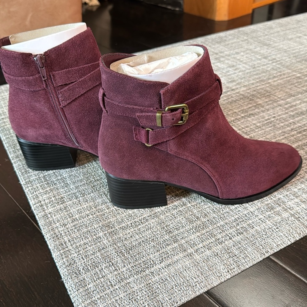 Booties with buckle at ankle. Zippered. Wine color. Size 8.5 New